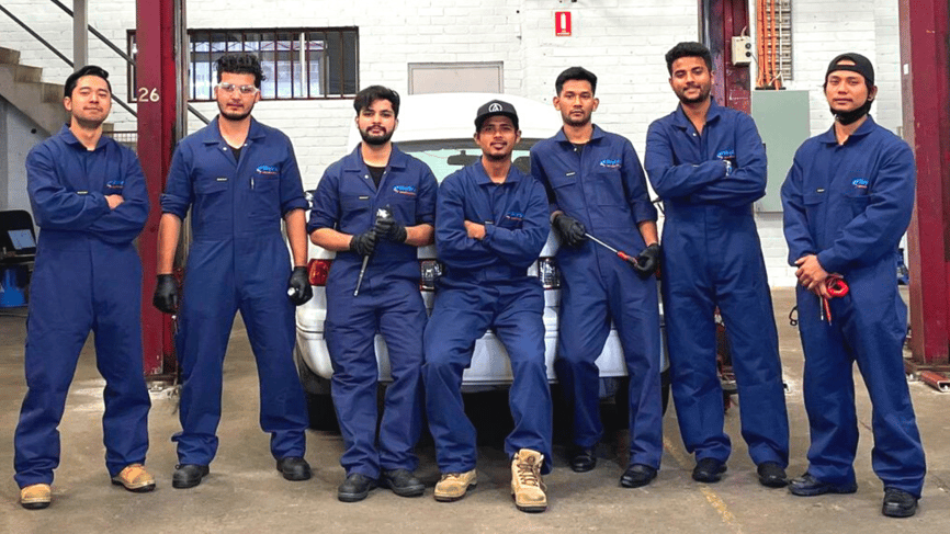 automotive students in workshop